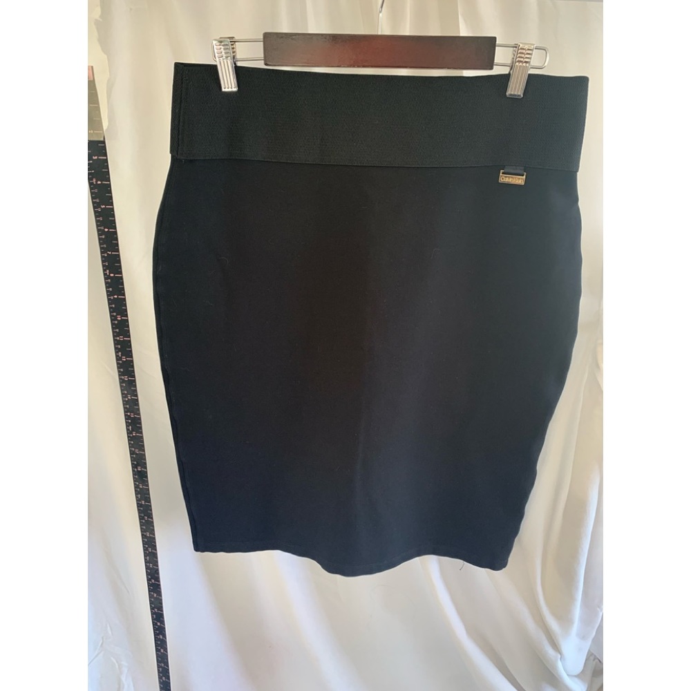 Large Calvin Klein pencil skirt with wide waist band.